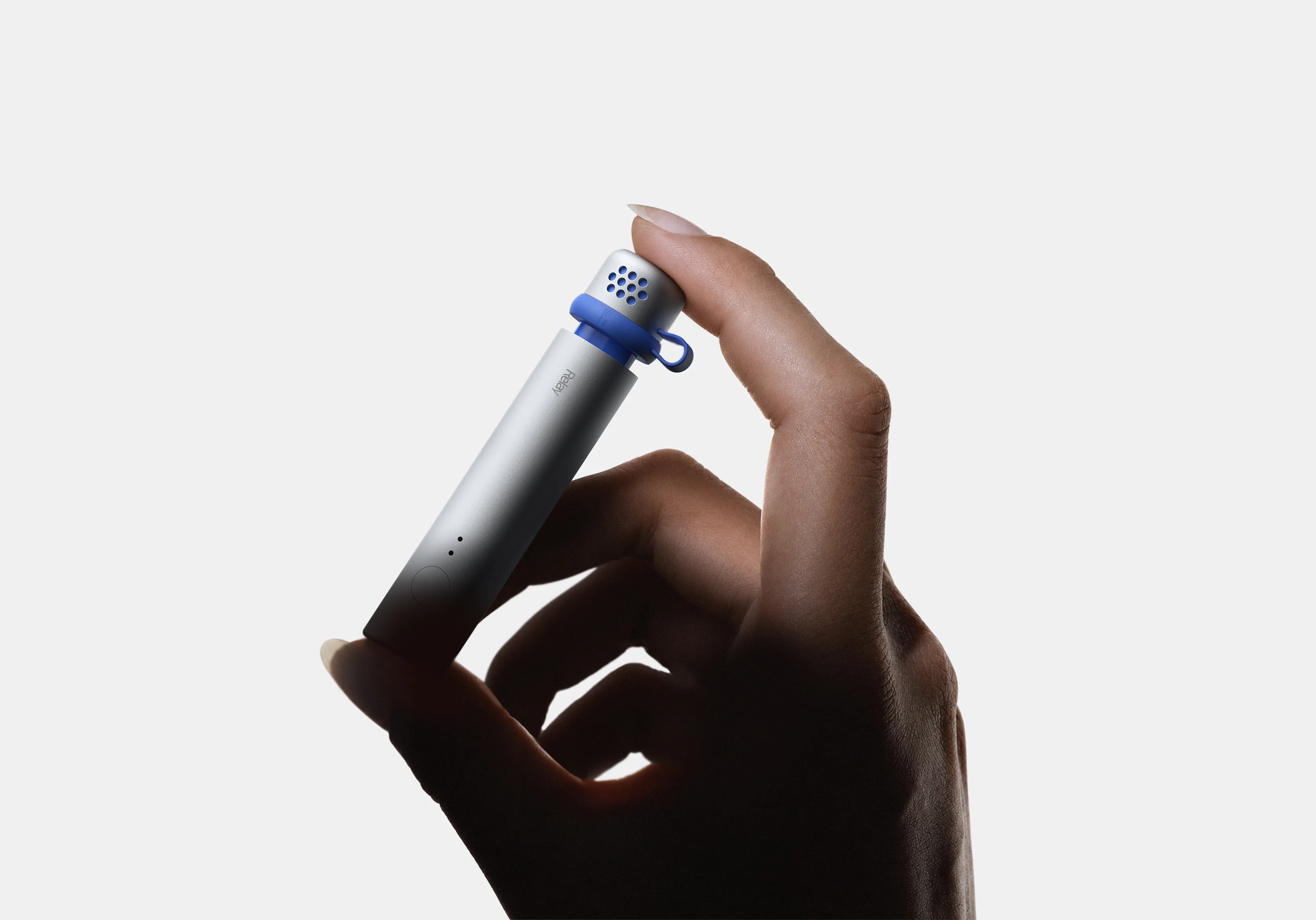 Relay Q held between a thumb and forefinger